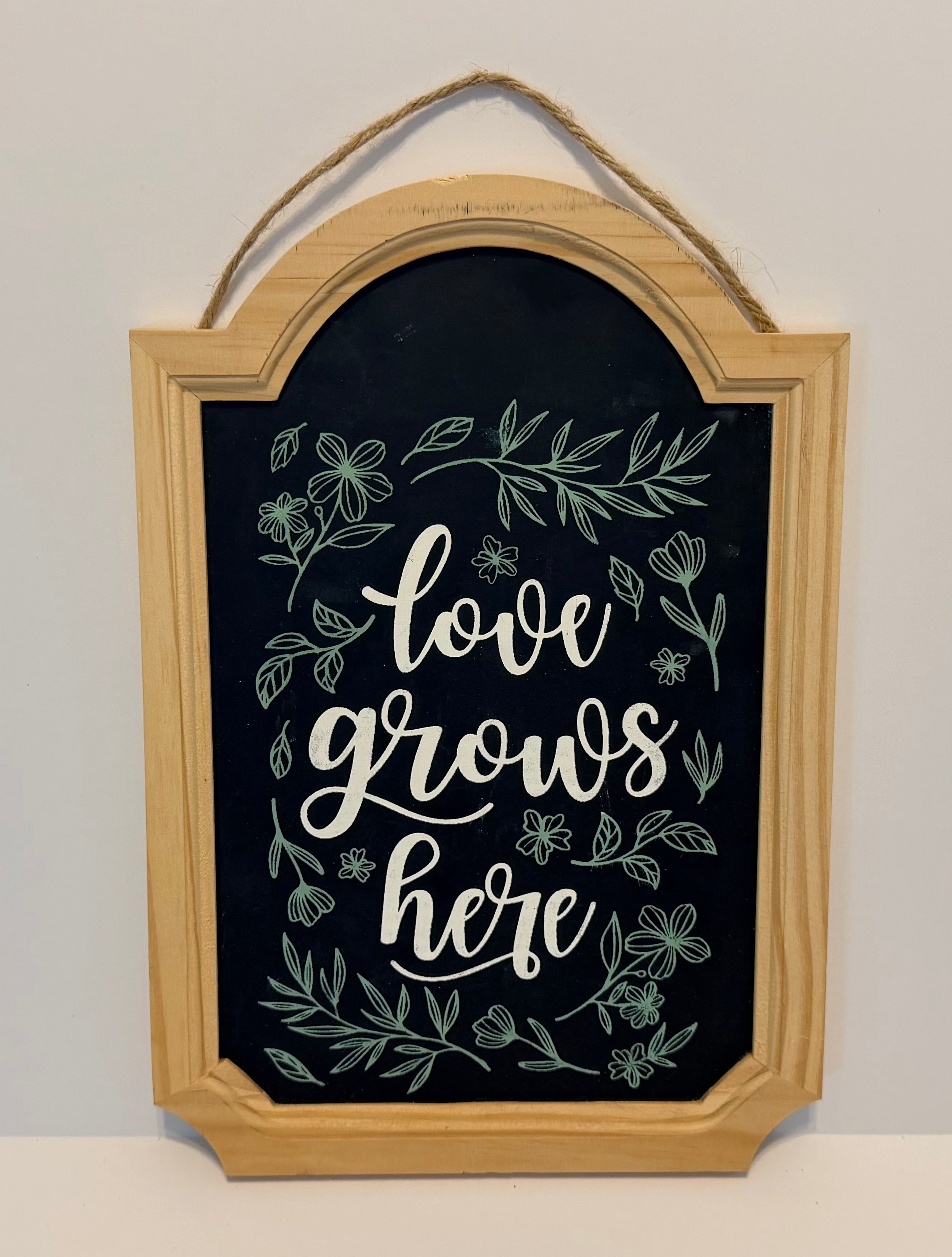 Love grows here sign