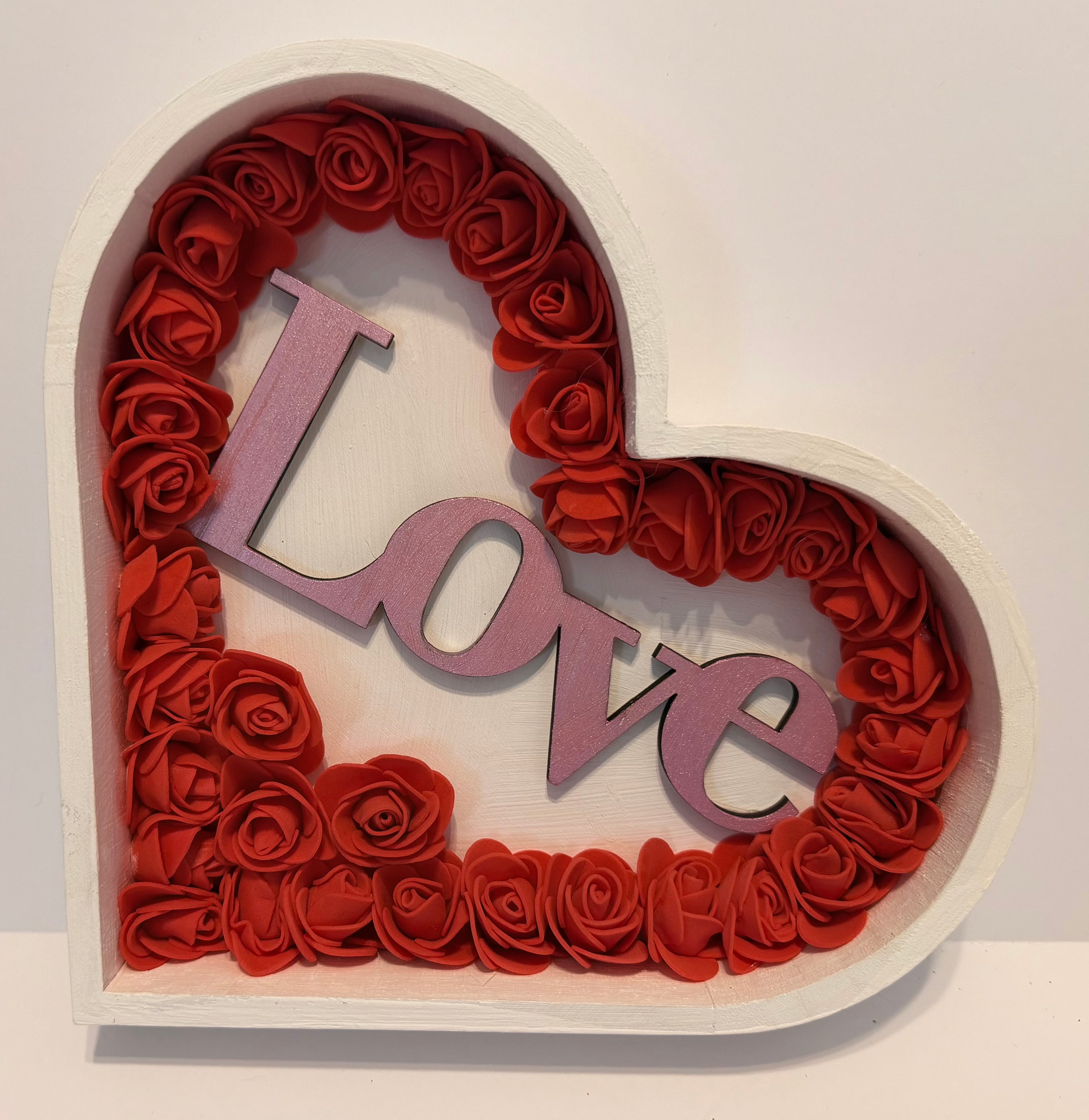 Heart shaped love sign